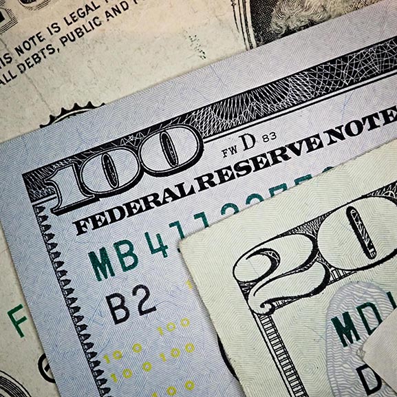 Macroeconomics news. Picture of a Federal Reserve Note.